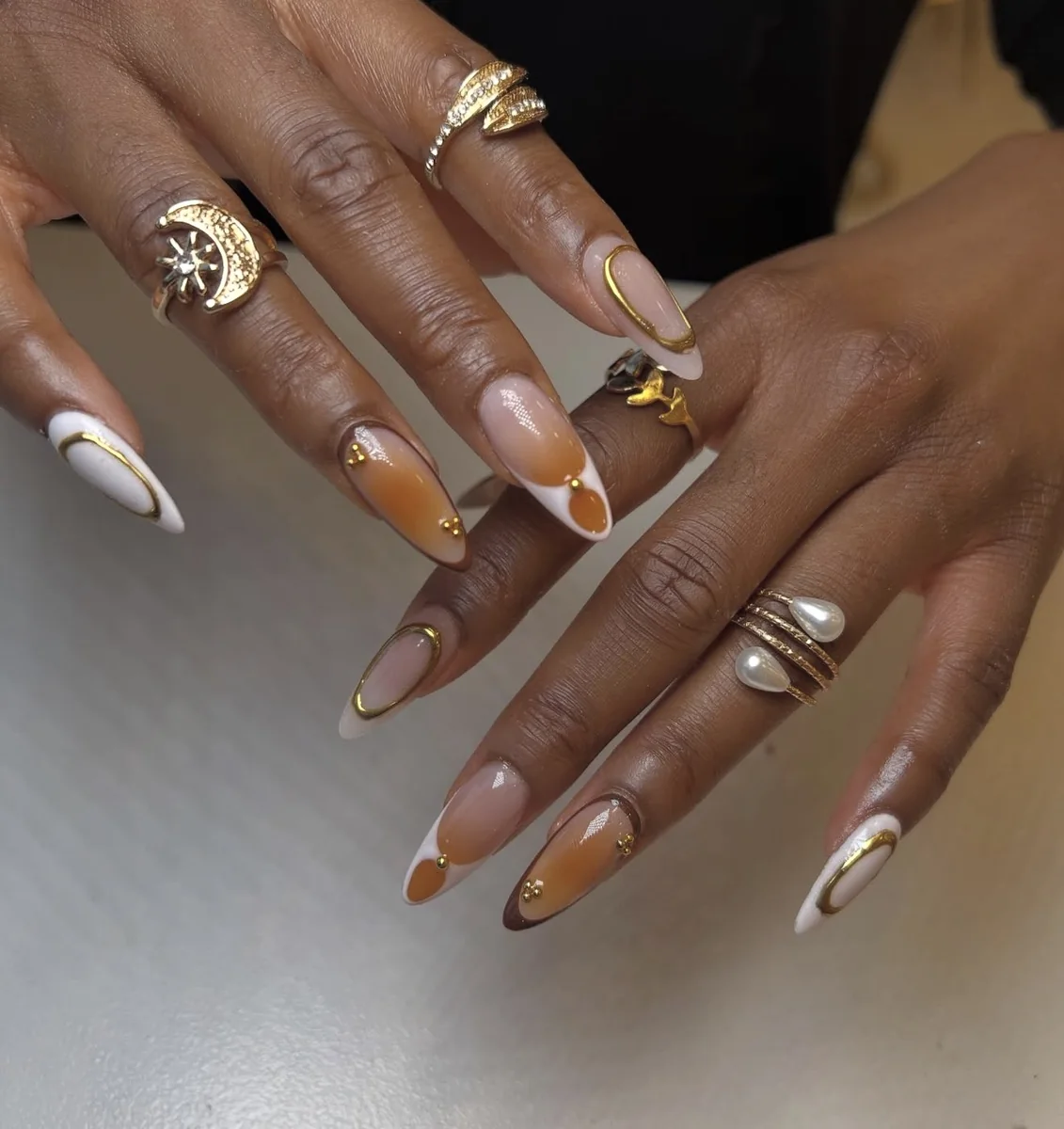Gold, caramel and white almond nail art at Jade Nail Spa Nottingham
